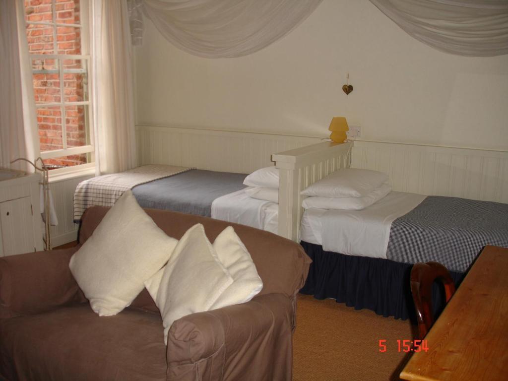 Cornerstones Guest House Sale Quarto foto